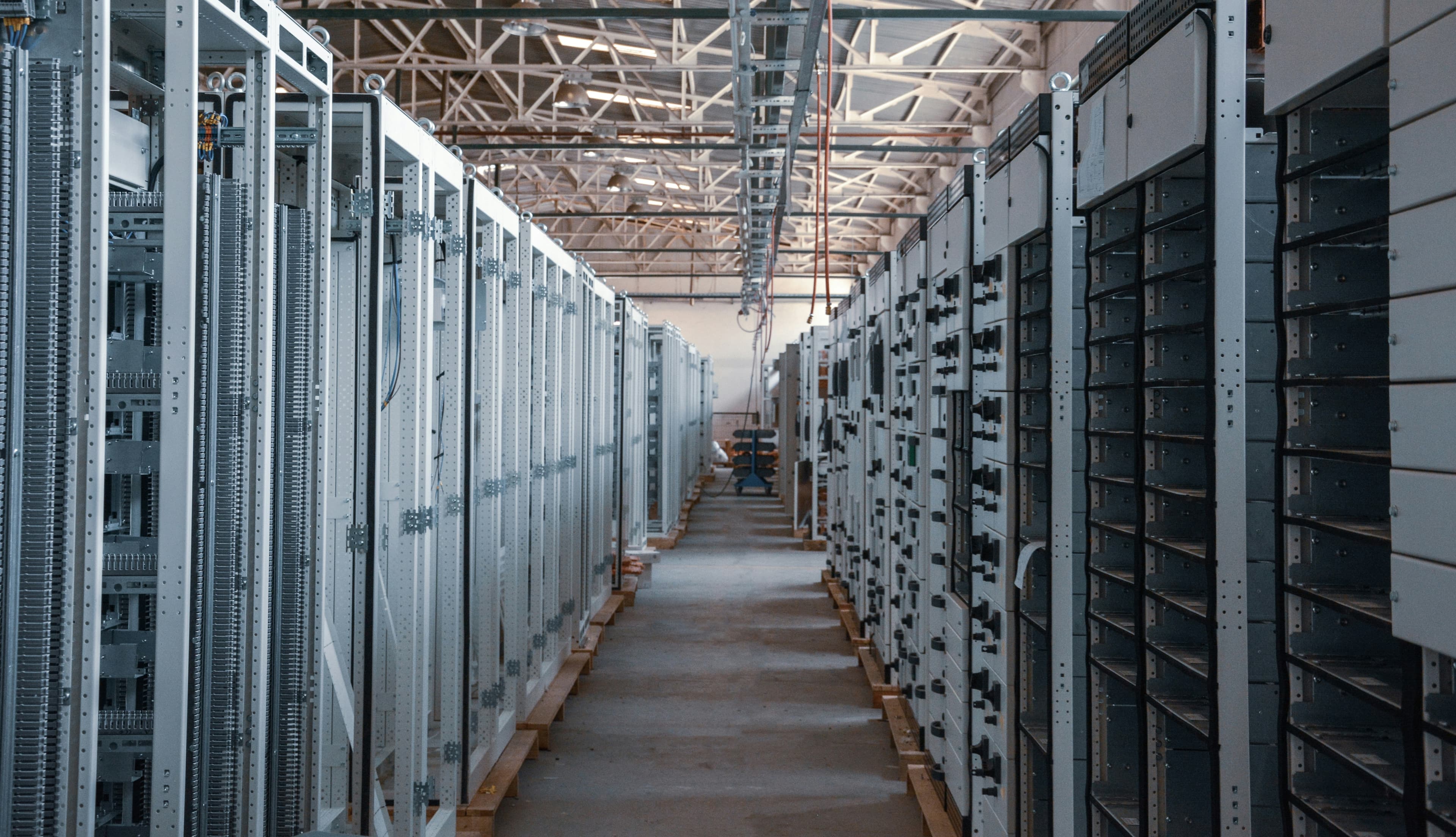 AI data center hall with high-density compute racks and integrated power block.